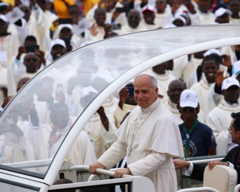 Tens of thousands gather outside Angolan capital for Pope Leo Mass