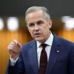 Canada's prime minister says economic ties with US are a weakness that must be corrected