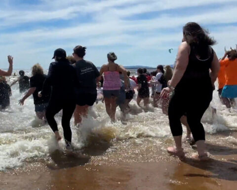 Polar Plunge benefiting Special Olympics NY brought hundreds to Plattsburgh City Beach