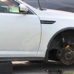 Man killed after car falls on him while changing tire