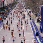 Former first daughter Chelsea Clinton completes Boston Marathon, Bill and Hillary meet her at finish