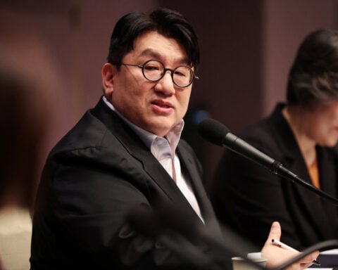 South Korea police seek detention warrant for BTS agency founder Bang