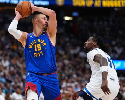 Edwards and Randle rally Timberwolves past Nuggets 119-114 to even series at 1 apiece