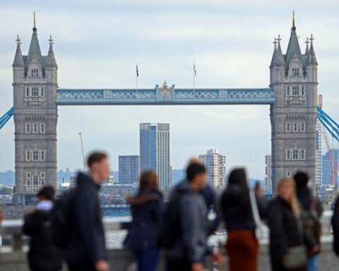 UK labour market cools by less than expected in three months to February
