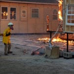 As the planet warms, scientists burn homes to figure out how to best protect them in wildfires