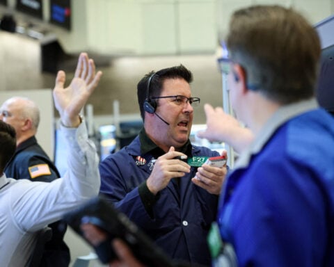 Wall Street opens higher as AI optimism, earnings counter Middle East concerns