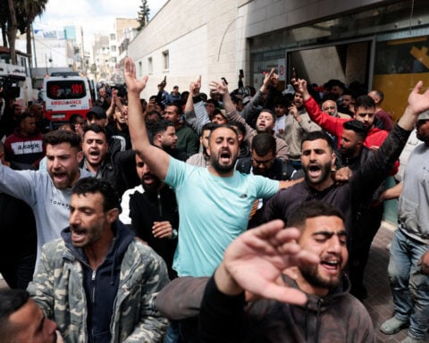 Two Palestinians killed in West Bank village attacked by Israeli settlers, witnesses say