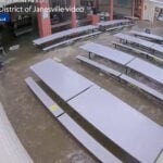 Water rushes into elementary school amid severe storm flooding