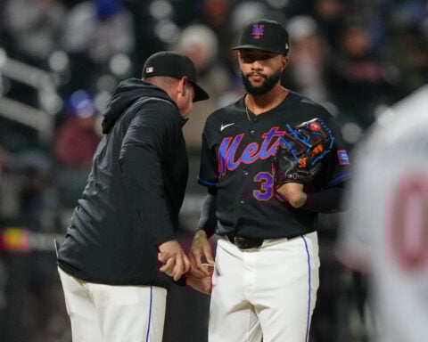 Mets fans mostly stay home but fill Citi Field with late boos as New York's skid hits 12 games