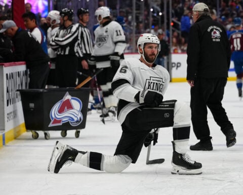 Kings interim coach D.J. Smith hit by shattered glass as panel breaks behind LA bench in Game 2