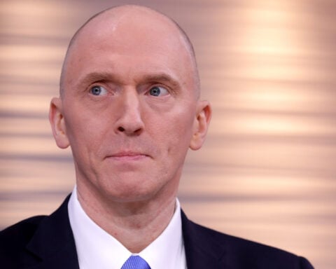Trump administration settles lawsuit with ex-Trump adviser Carter Page