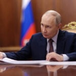 Olympics-Putin criticises previous IOC leadership as 'shameful, cowardly'