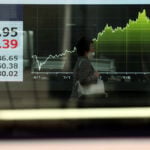 Asian shares track Wall Street to record highs but higher oil prices a risk