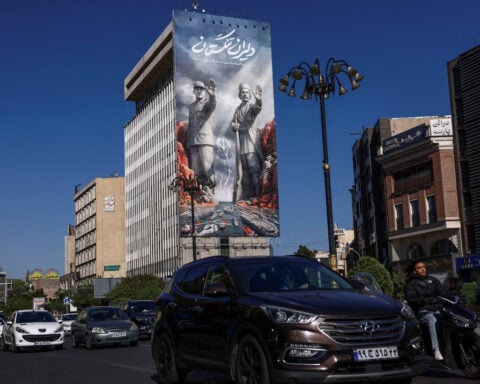 Iran tightens control of Hormuz after US calls off renewed attacks