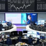 Iran flaunts its grip, investors cower