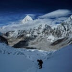 A massive, unstable ice block stalls Everest climbers at base camp