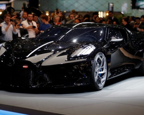 Porsche, under pressure to cut costs, divests from Italian sportscar maker Bugatti