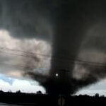 Tornado barrels through Oklahoma, damaging homes and shutting down roads