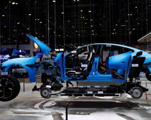 After call from Beijing, China's auto industry races to embed AI in just about everything