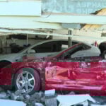 Truck crashes into home leaving rare car with extensive damage