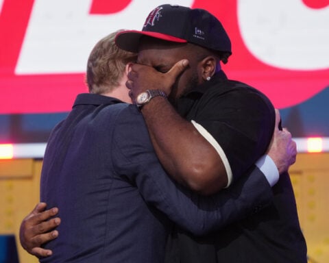 Kayden McDonald's long wait in the NFL draft green room ends with tears and a new job in Houston