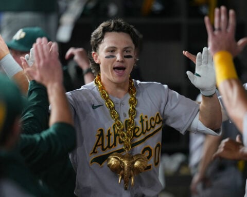 Athletics hit 3 solo homers on 7 pitches off Rangers' Eovaldi in 1st inning en route to 8-1 victory