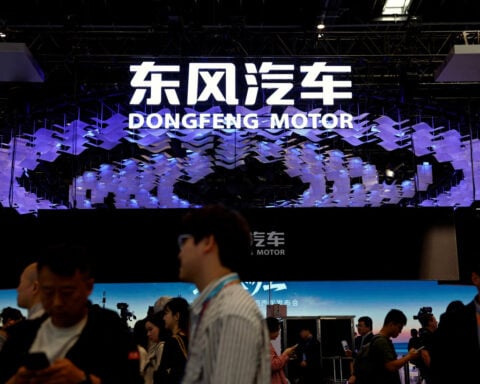 After call from Beijing, China's auto industry races to embed AI in just about everything