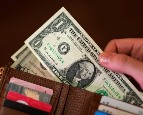 Dollar slips as DOJ drops Powell probe, clearing path for Warsh