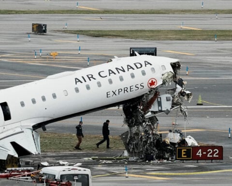NTSB says runway safety system did not activate before fatal Air Canada Express collision