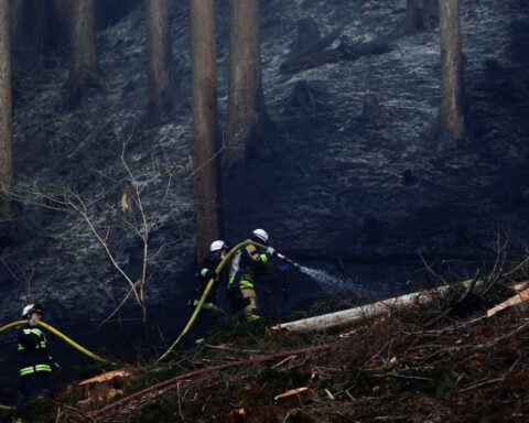 Firefighters in northern Japan struggle to contain blazes as over 3,000 people evacuated
