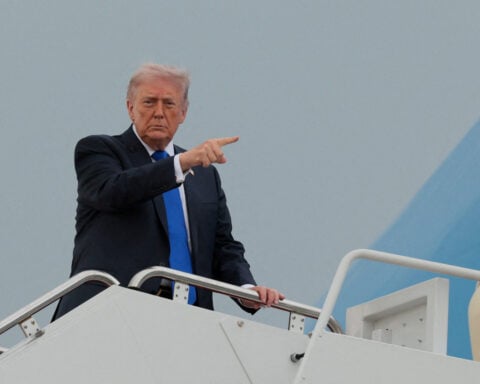 Republicans retool midterm strategy: Trump's policies, but less Trump