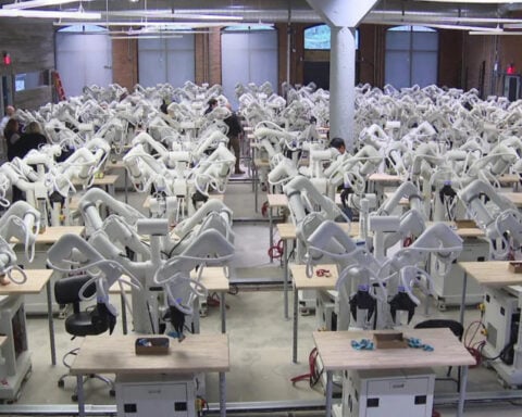 AI robots are learning to do simple human tasks at a factory in Massachusetts
