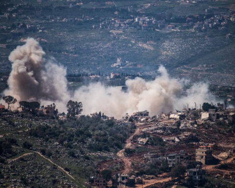 Israel says it will attack Hezbollah 'forcefully' as four killed in strikes on southern Lebanon