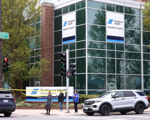 1 Chicago police officer killed, another wounded when suspect transported for treatment opens fire at hospital, officials say