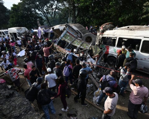 Highway bombing in Colombia kills at least 14 amid a ‘wave’ of attacks