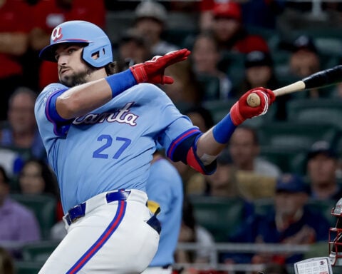 Bryce Harper leads Phillies past Braves 8-5 in 10 innings to stop 10-game losing streak