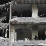 The Latest: Trump says he called off dispatching envoys to Iran talks