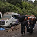 Death toll from bus bombing in southwest Colombia rises to 20 during a wave of violence