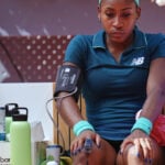 Coco Gauff overcomes vomiting on court to beat Sorana Cirstea in Madrid