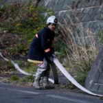 Tsunami survivor battles wildfire to protect hometown in Japan's northeast