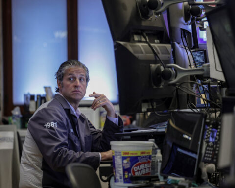 S&P 500, Nasdaq, close slightly higher in cautious start to a heavy earnings week