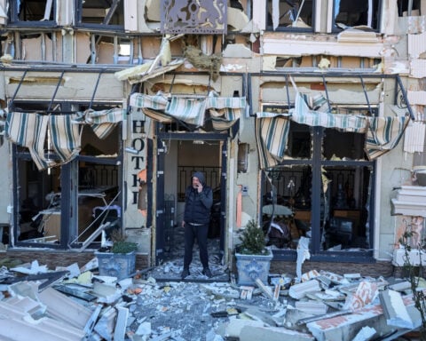 Russian drone attack on Odesa wounds 14, officials say