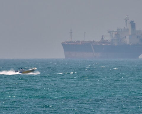 The Latest: Iran wants Strait of Hormuz reopening tied to an end to the war, officials say