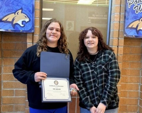 Middle schooler awarded certificate and police badge after saving friend