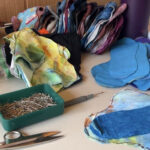 Local groups create reusable menstrual pads to help families in need