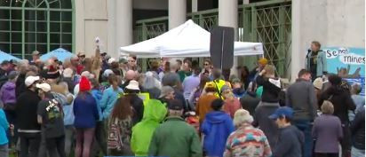 Singing protesters speak out against lifting of mining ban near Boundary Water