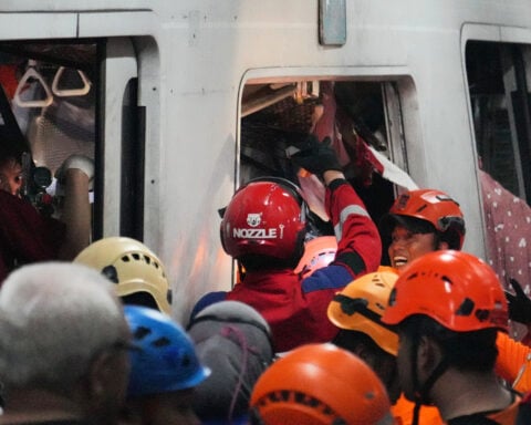 Trains collide near Indonesia's capital, killing at least 4 people