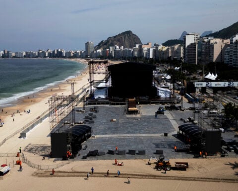 Construction of the stage for Shakira's concert in Brazil resumes after worker's death