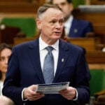 Canada is still reviewing plan to buy US fighter jets, defense minister says