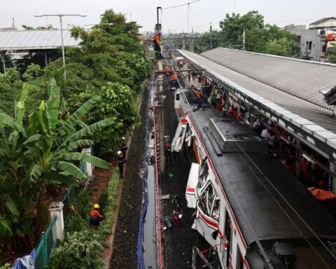 At least four killed in train collision on outskirts of Indonesian capital